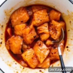 a bowl of food with a spoon in it.