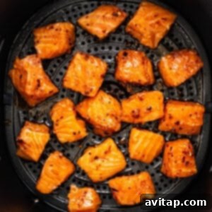 the food is being cooked in the air fryer.