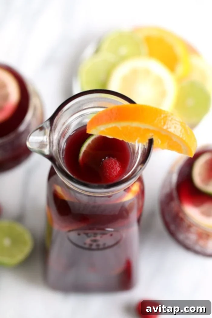 easy red wine sangria with orange slice, perfect for parties and gatherings