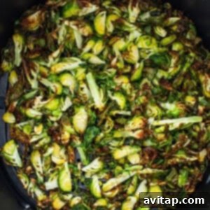 Crunchy Air Fried Brussels Salad 9 Brussels sprouts in an air fryer.