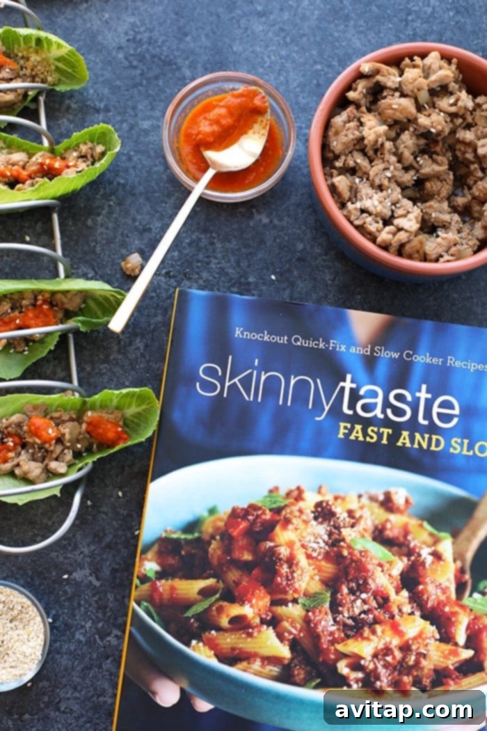 Skinnytaste Cookbook Inspiration: Korean Chicken Lettuce Wraps The Skinnytaste Fast and Slow Cookbook open to the Korean Lettuce Wraps recipe, alongside a plate of the finished dish.