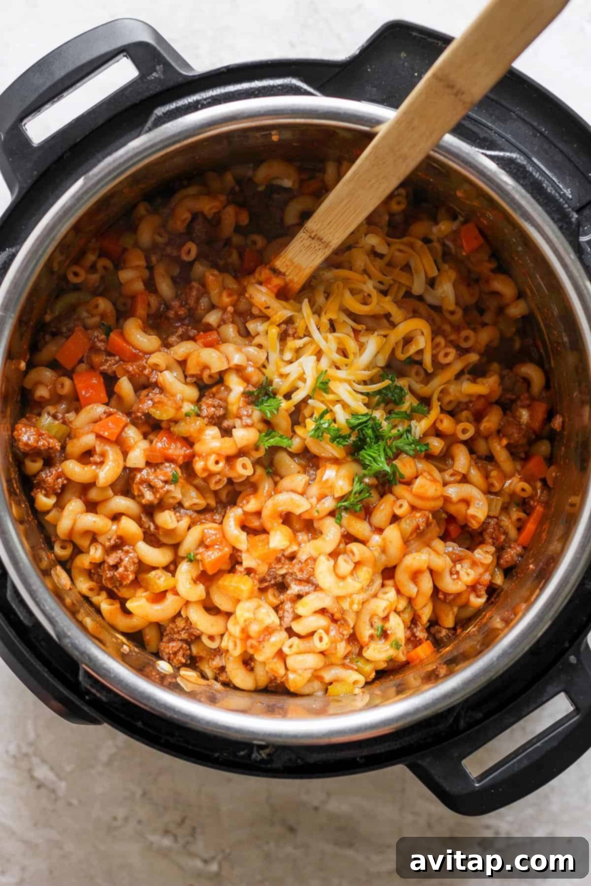 A pot of pasta and meat in an instant pot.
