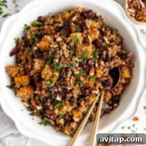 Finished Quinoa Stuffing, steamy and inviting, in a Dutch oven after baking.