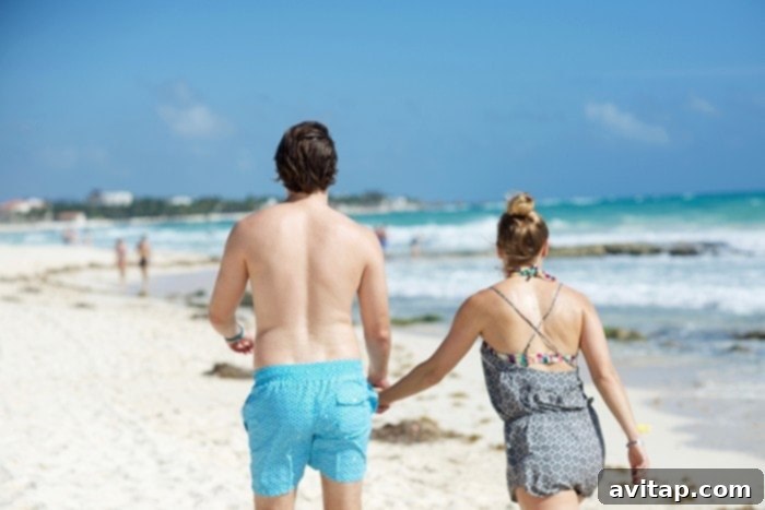 Enjoying a peaceful walk along the pristine beach of Riviera Maya.