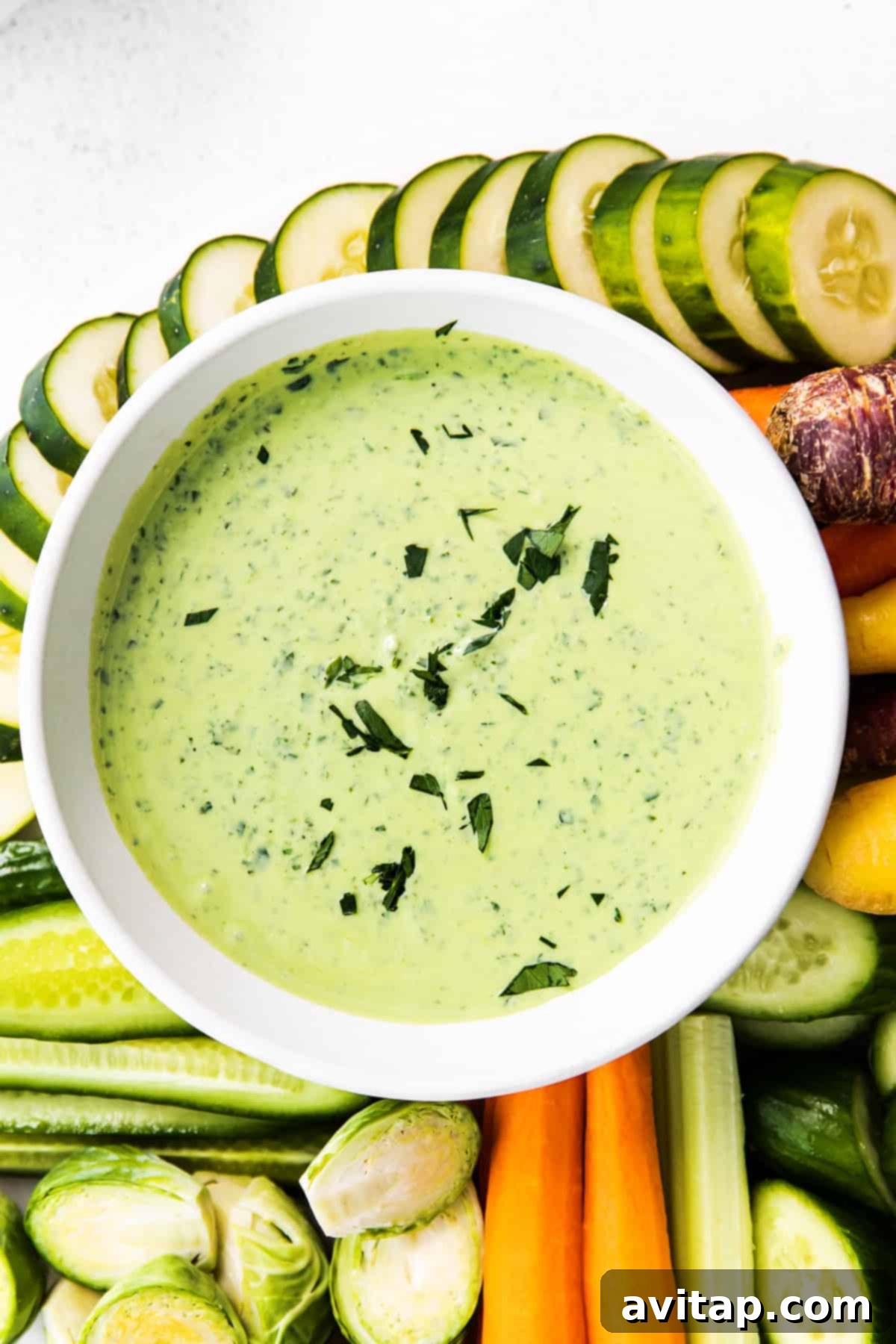 Vibrant Green Goddess Dressing served in a elegant bowl, ready to be enjoyed.