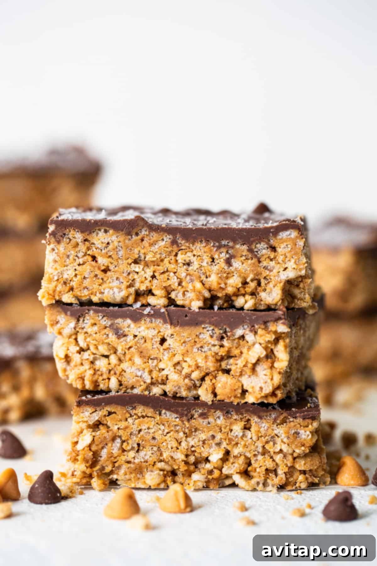 A stack of delicious chocolate peanut butter granola bars, hinting at a variety of healthy snack options.