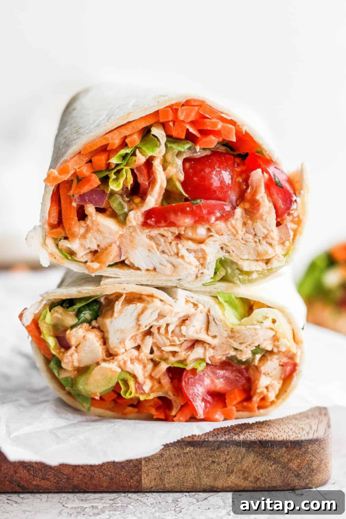 Two Buffalo Chicken Wraps, perfectly stacked and sliced, ready to be served