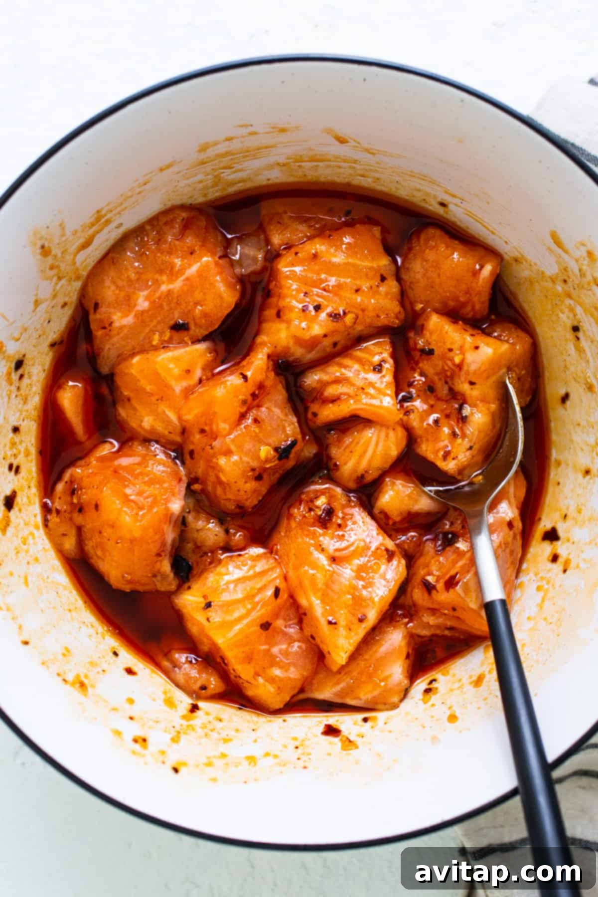 a bowl of food with a spoon in it.