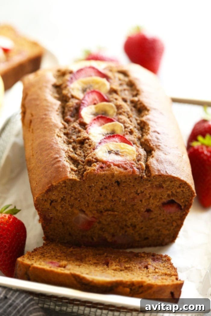 Effortless Strawberry Banana Bread 6 Individual slices of strawberry banana bread, perfect for serving.