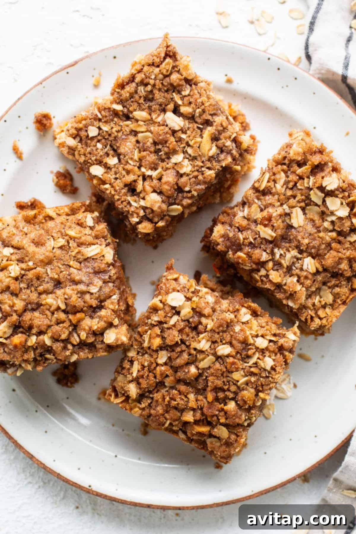 A beautifully baked Carrot Cake Coffee Cake with a golden streusel topping, ready to be served.