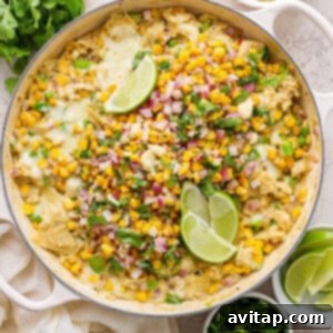 Mexican corn enchiladas in a skillet, garnished with fresh toppings.