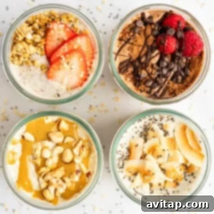 Top-down view of four jars filled with different flavors of overnight oats, garnished with toppings like strawberries, chocolate, raspberries, nuts, and coconut flakes, arranged in a 2x2 grid, showcasing the finished product.
