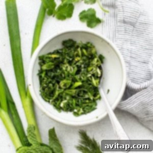 Fresh, aromatic herbs and zesty ingredients combined in a bowl for the vibrant gremolata, ready to brighten the dish.