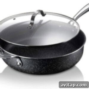 A sleek, black pot with a tight-fitting lid resting on a clean white background, highlighting its versatile design for various culinary tasks.