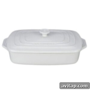 Savory Greek Chicken Orzo Bake 4 White casserole dish.