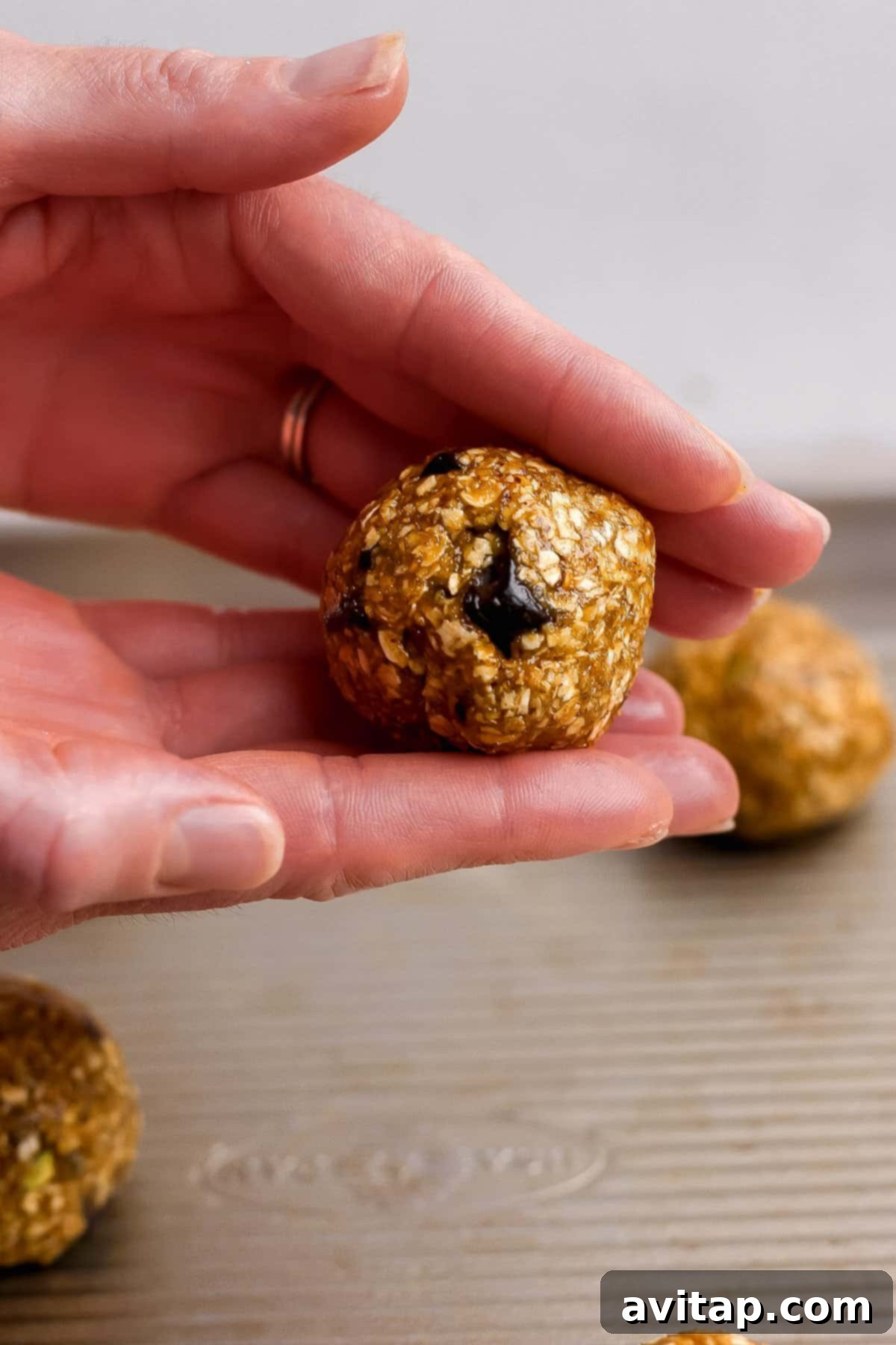 Chocolate Pistachio Dream Cookies 4 Round, oat-based energy bite with a visible chocolate chip.