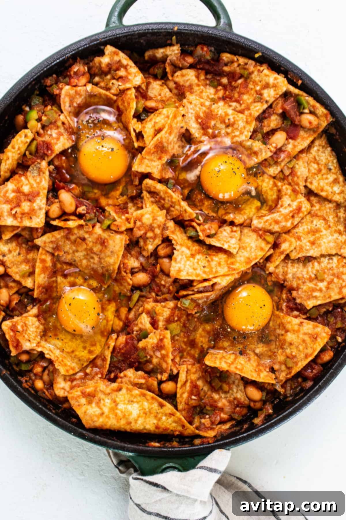 Effortless Chilaquiles Feast 4 Chilaquiles with perfectly baked eggs on top, ready to serve.