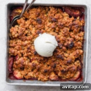 peach crisp in a square baking dish.
