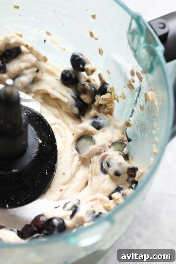 Cool off this summer with this Vegan Blueberry Muffin Banana Soft-Serve. It is naturally sweetened, delicious, and made with only six ingredients!
