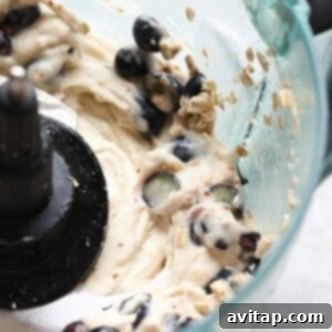 Blueberries and batter mixed together in a food processor for a Blueberry Muffin base.