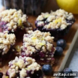 Delicious Blueberry lemon crumb bars, perfectly golden and inviting.