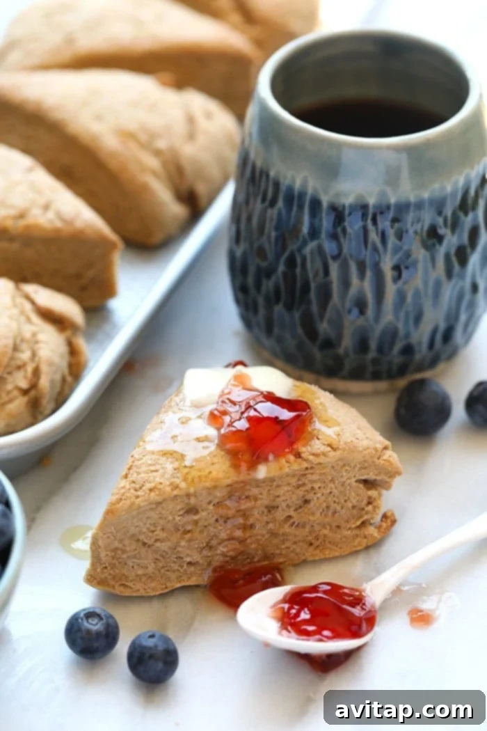 Hearty Whole Wheat Scones 2 Delicious Honey Whole Wheat Scones, a healthy and easy recipe from the Love Real Food Cookbook, perfect for breakfast or brunch. Made with white whole wheat flour, honey, and full-fat coconut milk for a light and tender texture.