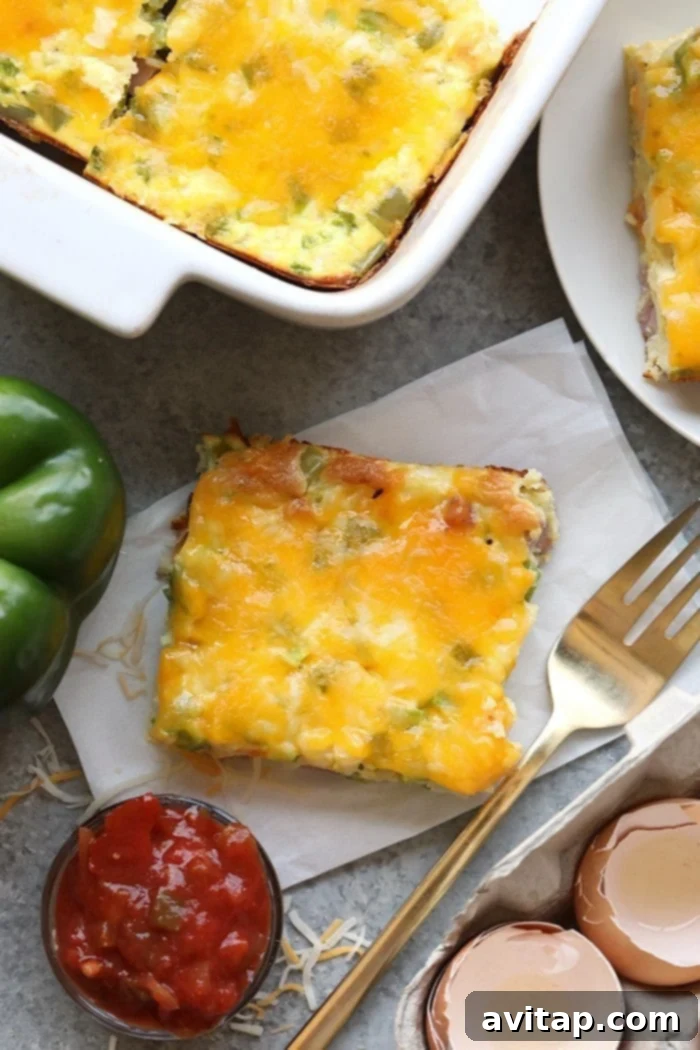Denver Omelet Casserole 9 A large Denver Omelette Egg Bake in a casserole dish, garnished and ready for a family breakfast.