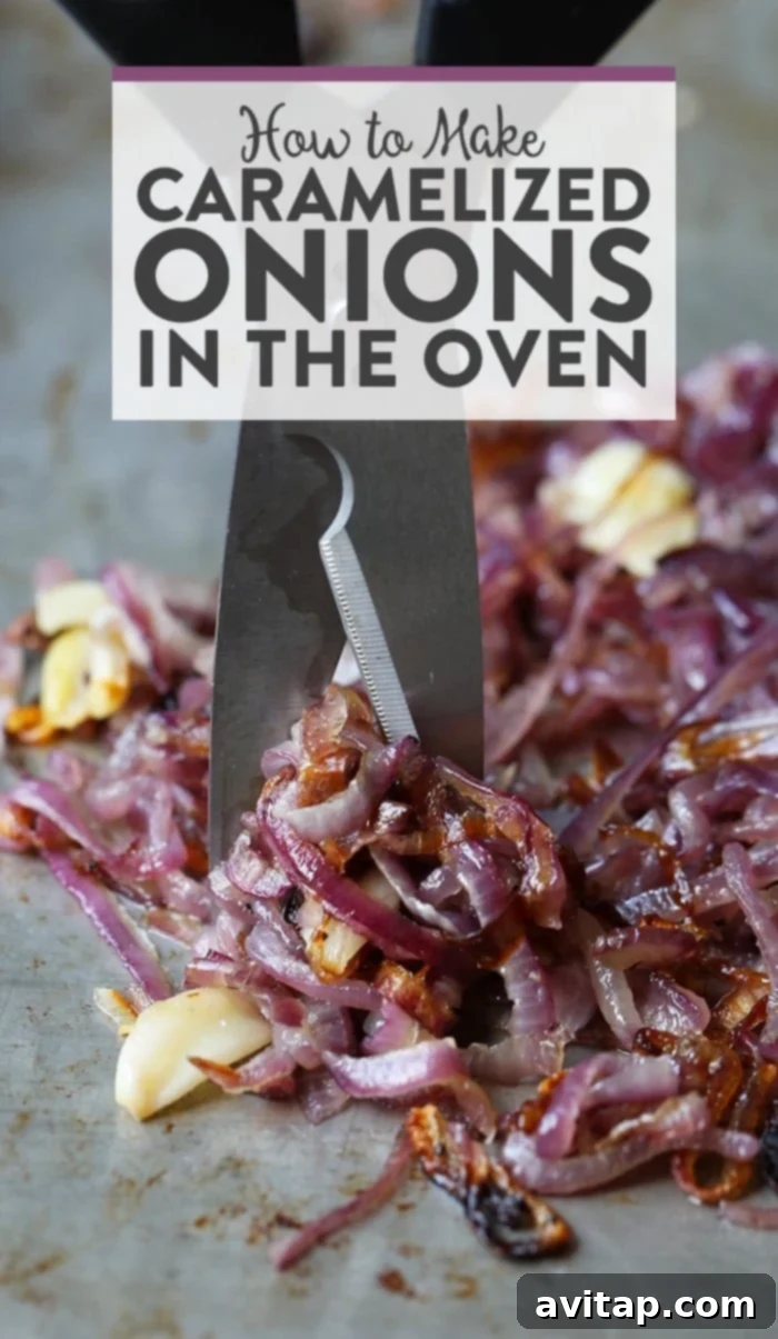 Oven Caramelized Onions 2 Golden-brown caramelized onions spread on a baking sheet, ready to be served