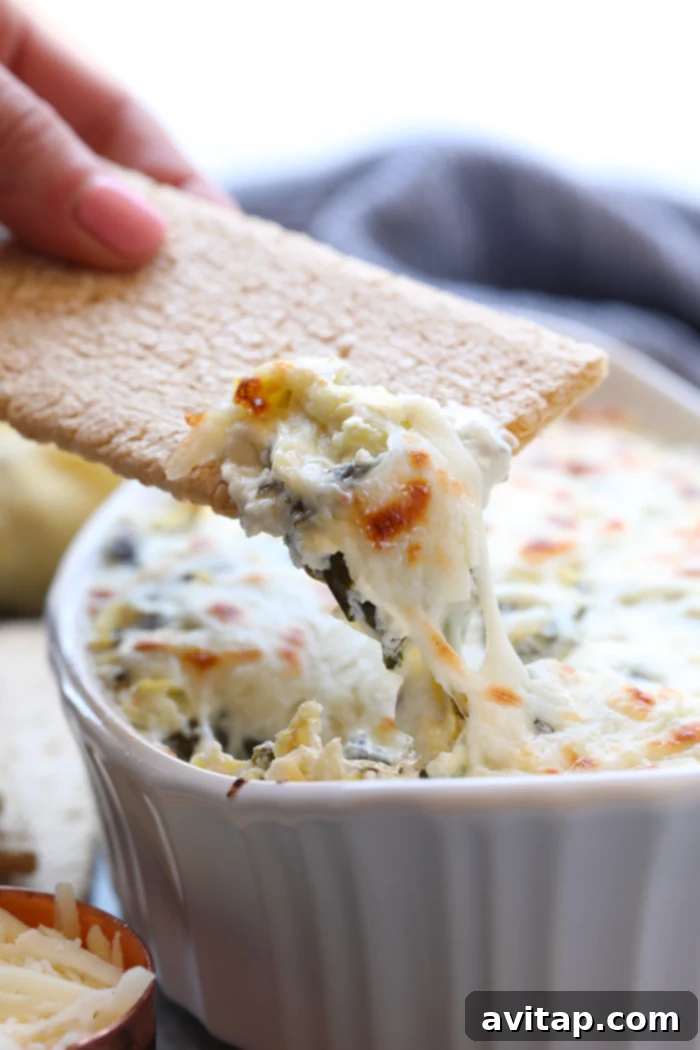 Creamy and delicious lightened up spinach and artichoke dip