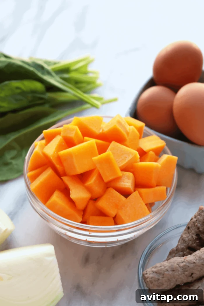Freshly cubed butternut squash in a bowl, ready for cooking.