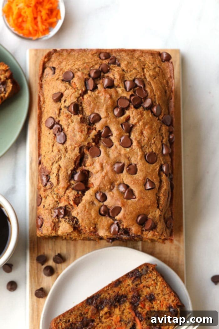 Close-up of a healthy carrot cake loaf, showcasing its texture and delicious ingredients.