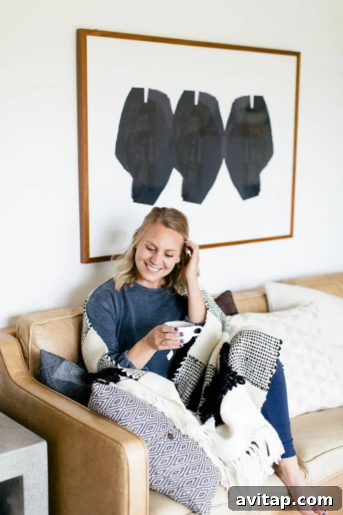 The Whole30 is the latest health craze, but I'm not convinced. Read all about why you'll never catch me doing the Whole30 or any kind of detox! A woman smiling, holding a healthy smoothie or meal.