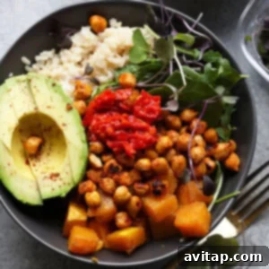 A completed healthy butternut squash buddha bowl, ready for serving.