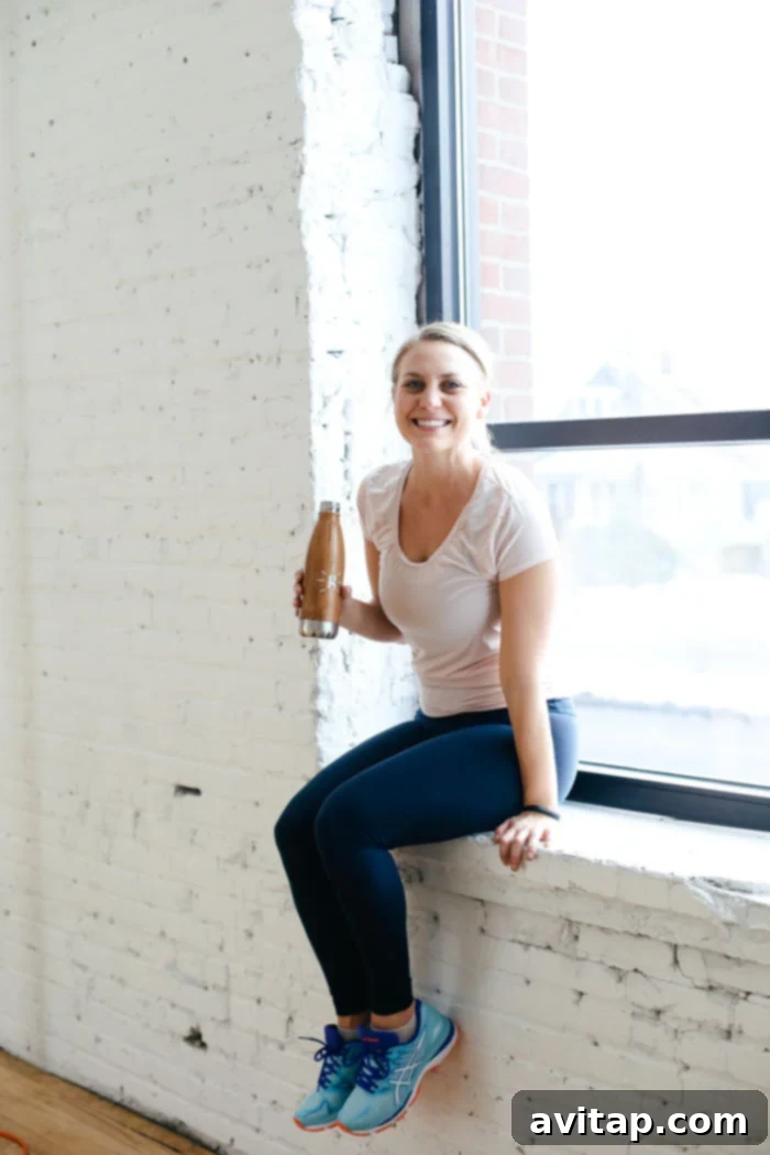Fitness enthusiast performing a high-intensity plyometric exercise.