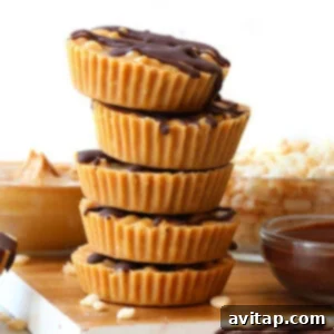 Have your healthy peanut butter cup and rice crispy treat too! These rice crispy peanut butter cups are made with just 5 simple ingredients and make for the perfect after dinner healthy treat.