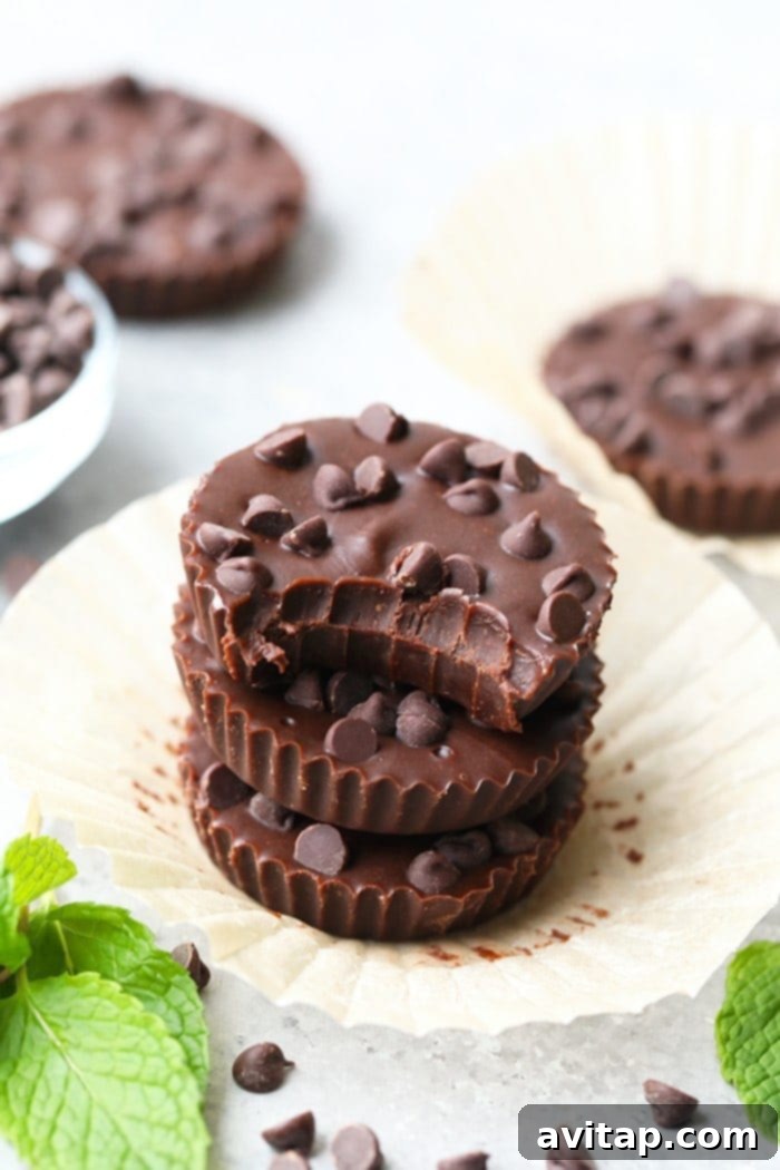 Mint Chocolate Almond Butter Cups 5 Thin Mint Almond Butter Cup with a bite taken out, showing the creamy interior