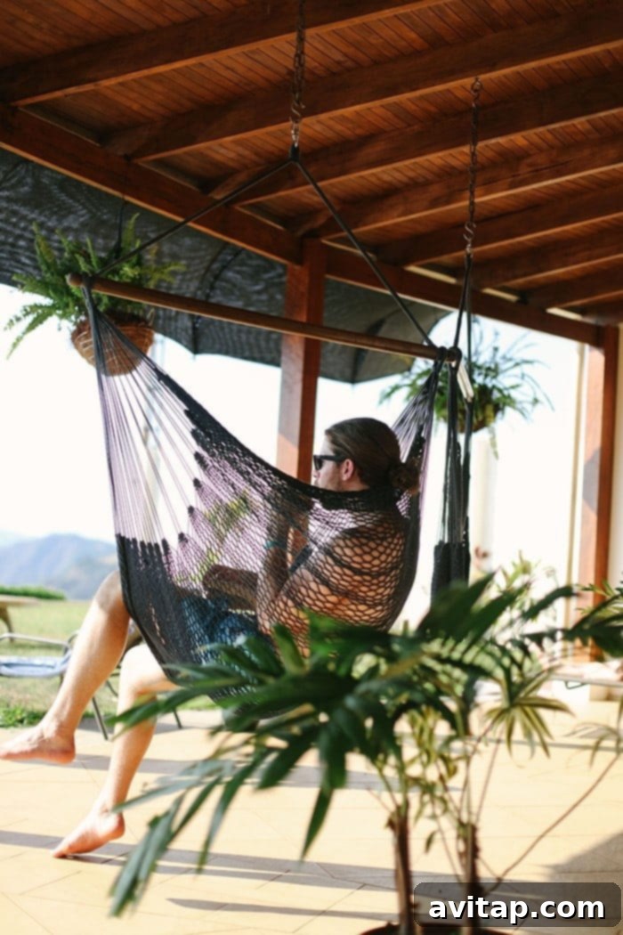 Relaxing hammock on a tropical patio, perfect for reading and enjoying the view