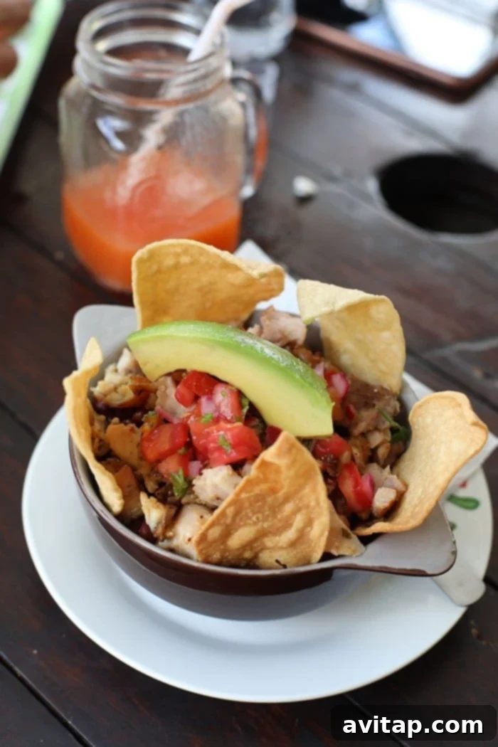 Delicious traditional Costa Rican Casado meal with rice, beans, plantains, and meat