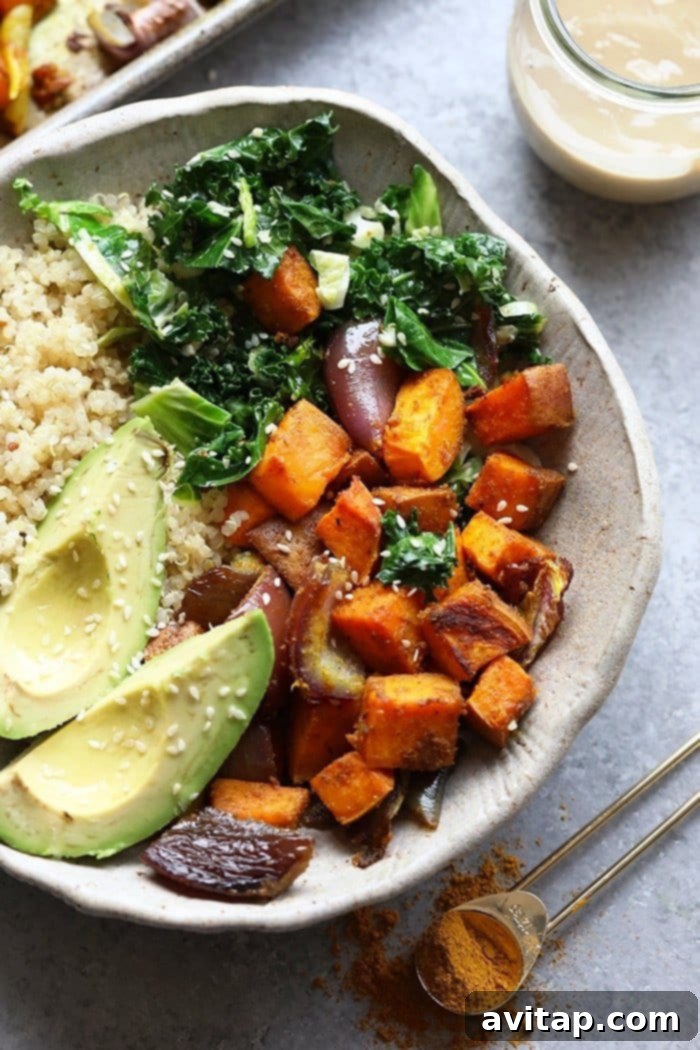 A fully prepared vegetarian buddha bowl, showcasing a medley of healthy vegetables and grains, ready to eat.