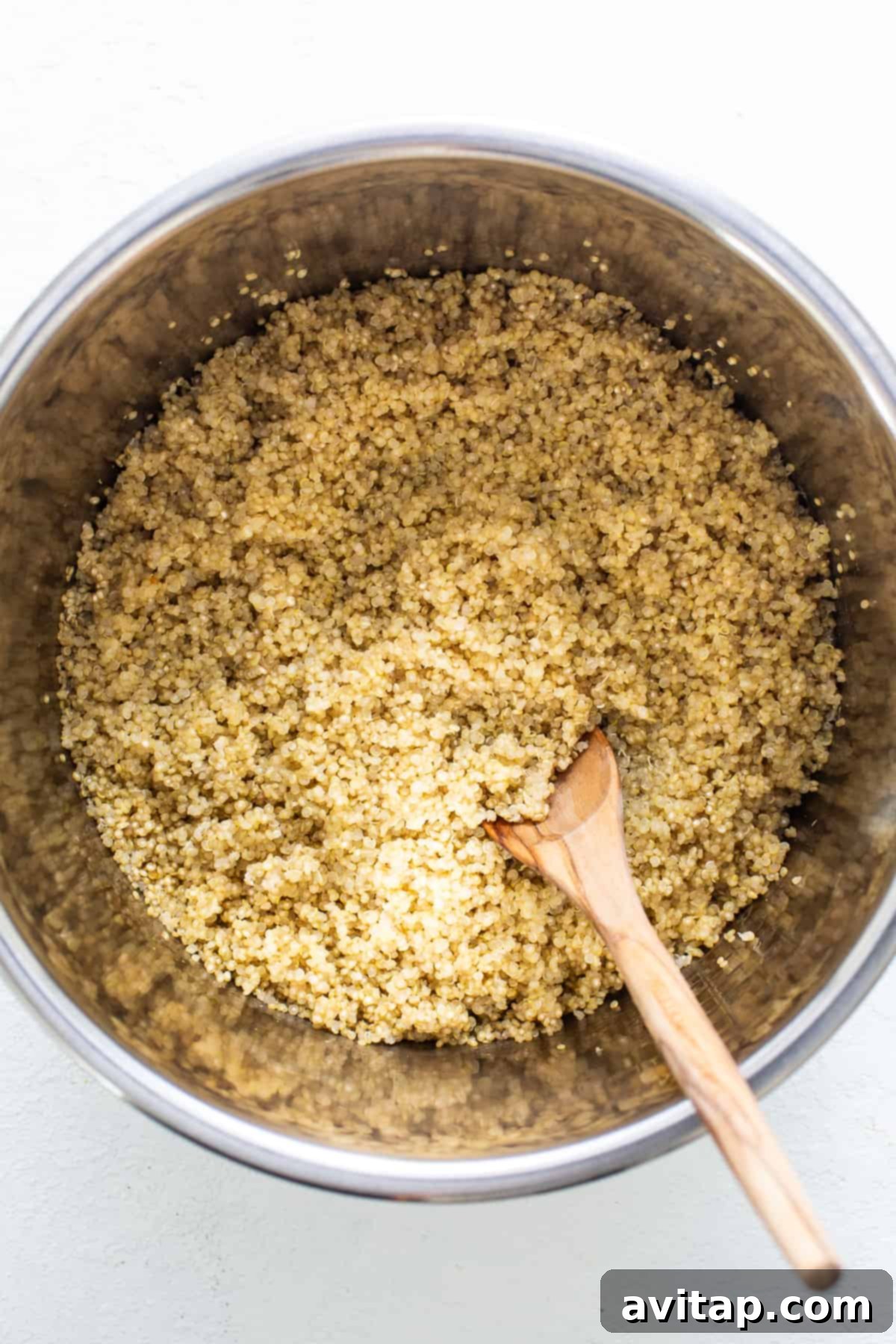 Effortless Instant Pot Quinoa 6 Fluffy, perfectly cooked quinoa inside an Instant Pot after the quick release.