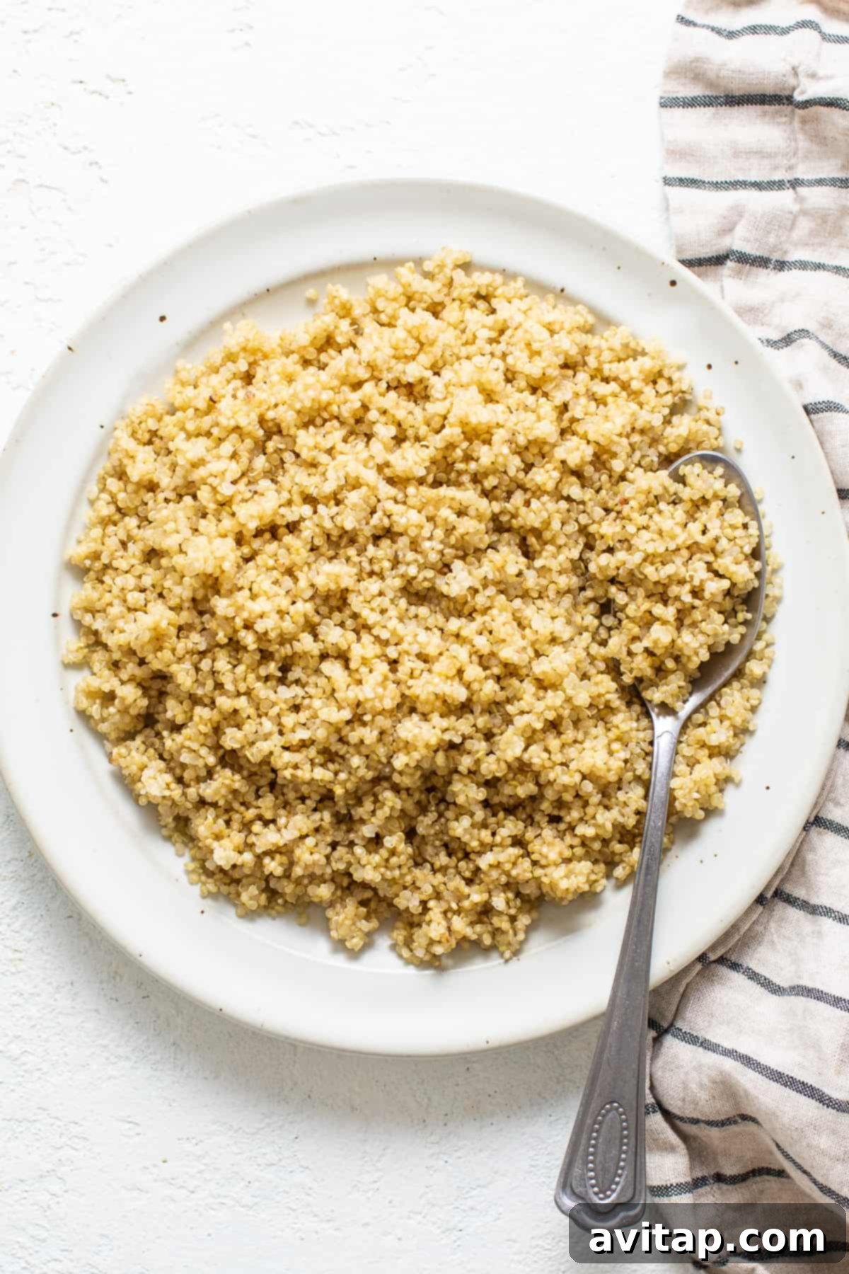 Effortless Instant Pot Quinoa 7 A bowl of fluffy, perfectly cooked quinoa, ready to be added to any meal.