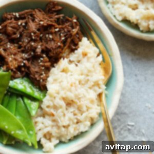 close-up of cooked coconut rice in a bowl, ready to serve