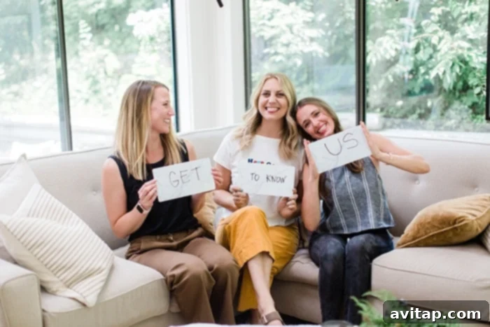 21 Questions to Get to Know Us 2 The Fit Foodie Finds team, Lee, Linley, and Emily, posing together and smiling brightly.