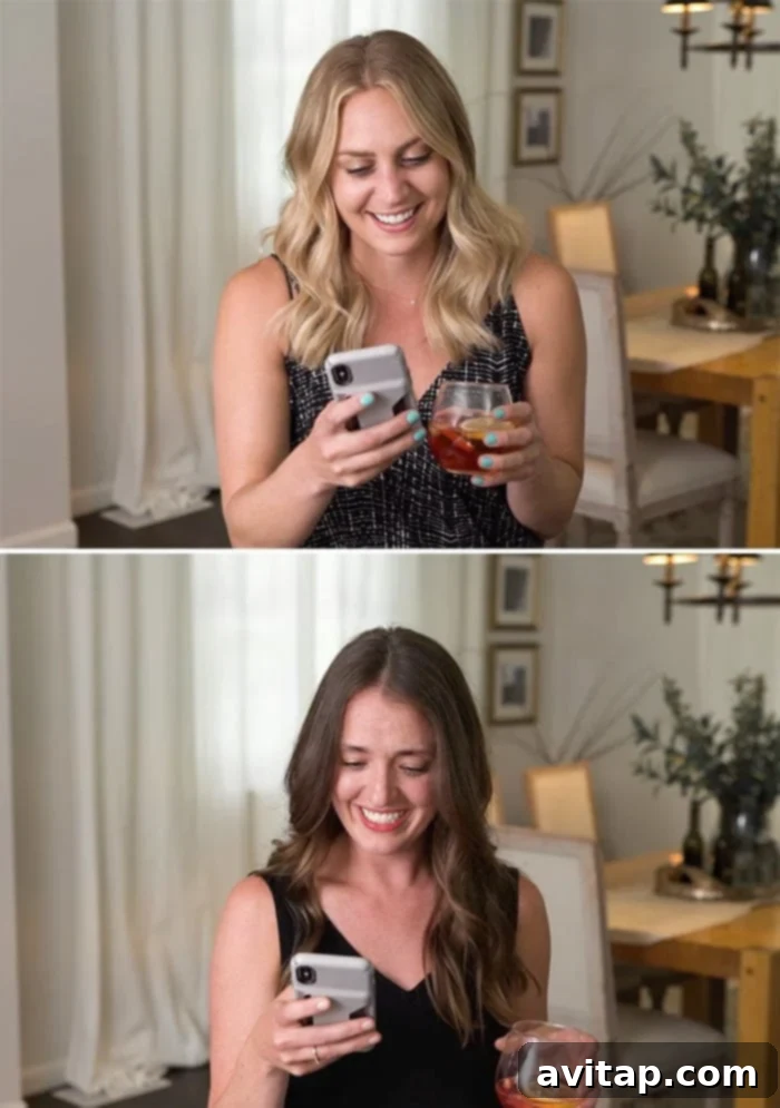 Two cheerful women from Fit Foodie Finds holding up signs with surprising mean comments, demonstrating their positive approach to online criticism.