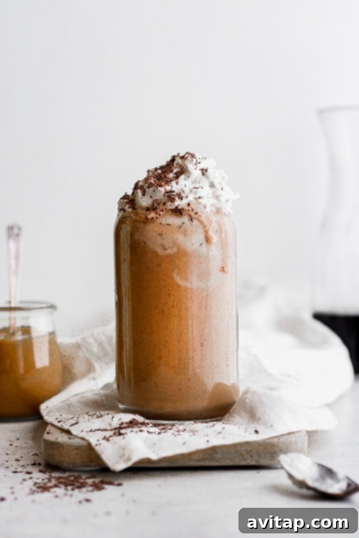 A breakfast smoothie with dairy free whip cream
