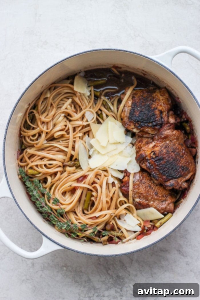 Close-up of balsamic roasted chicken with pasta and parmesan