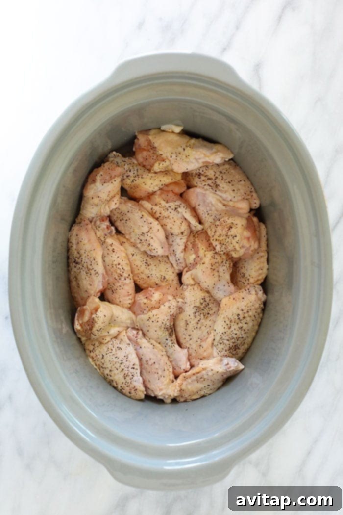 uncooked chicken wings in crockpot