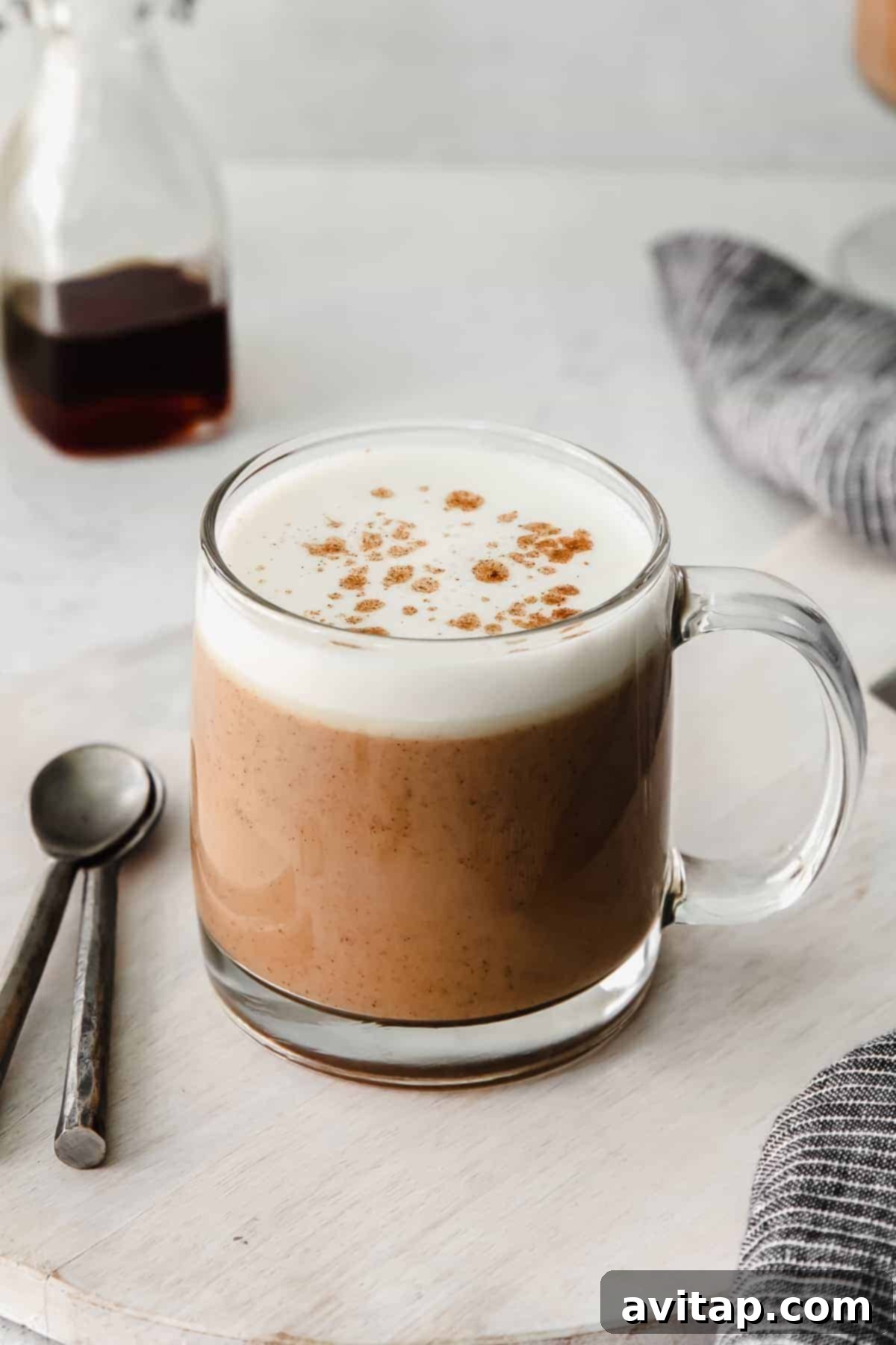 Steaming chai tea latte in a cozy mug, perfect for a cool day
