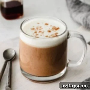 A perfectly prepared chai tea latte in a mug, ready to be enjoyed