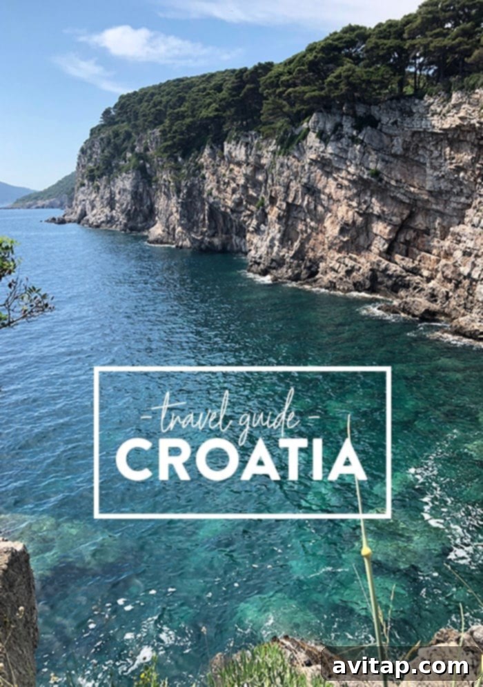 Your Ultimate Guide to Traveling in Croatia: Adriatic Adventures Await Traveler enjoying a scenic view in Croatia, with the clear blue Adriatic Sea and historic architecture in the background.